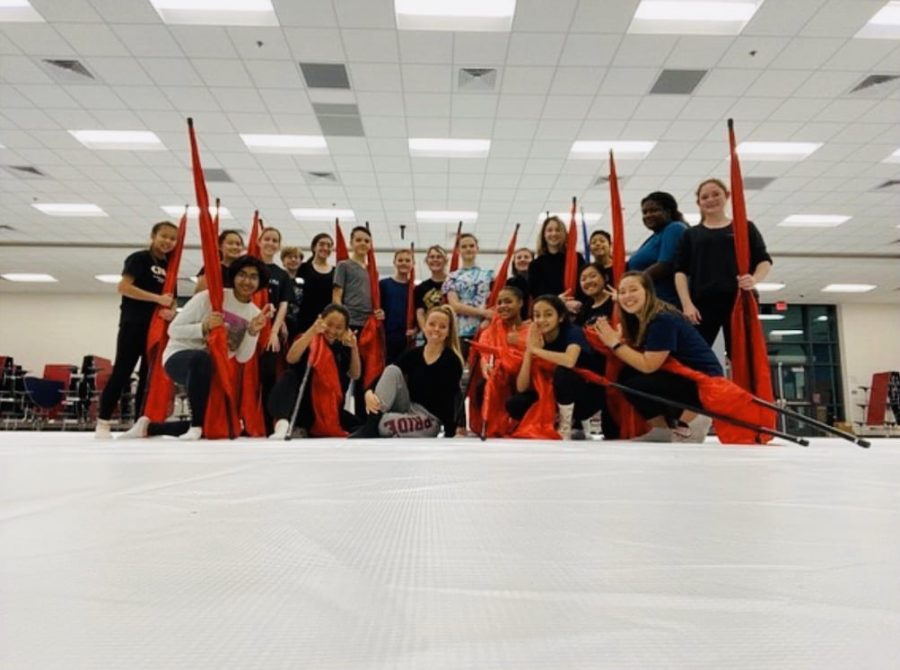 Independence+winter+guard+is+in+the+cafeteria+working+on+their+routines+for+their+upcoming+competitions.+