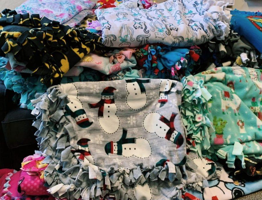 Stacks of fleece blanket donations were collected at the Brambleton Community Center. The homemade blankets were donated to the INOVA Childrens Hospital