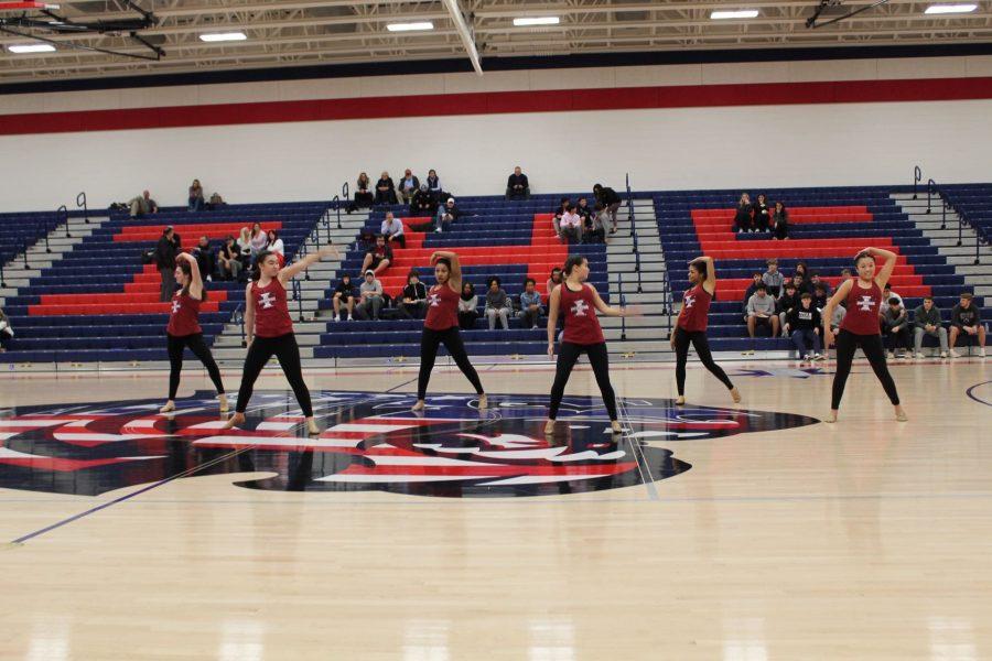 The Independence girls’ dance team performs during the boys’ varsity basketball game on Jan. 24, 2020