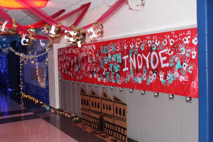 Sophomores show off school spirit with INDYOE banner. 